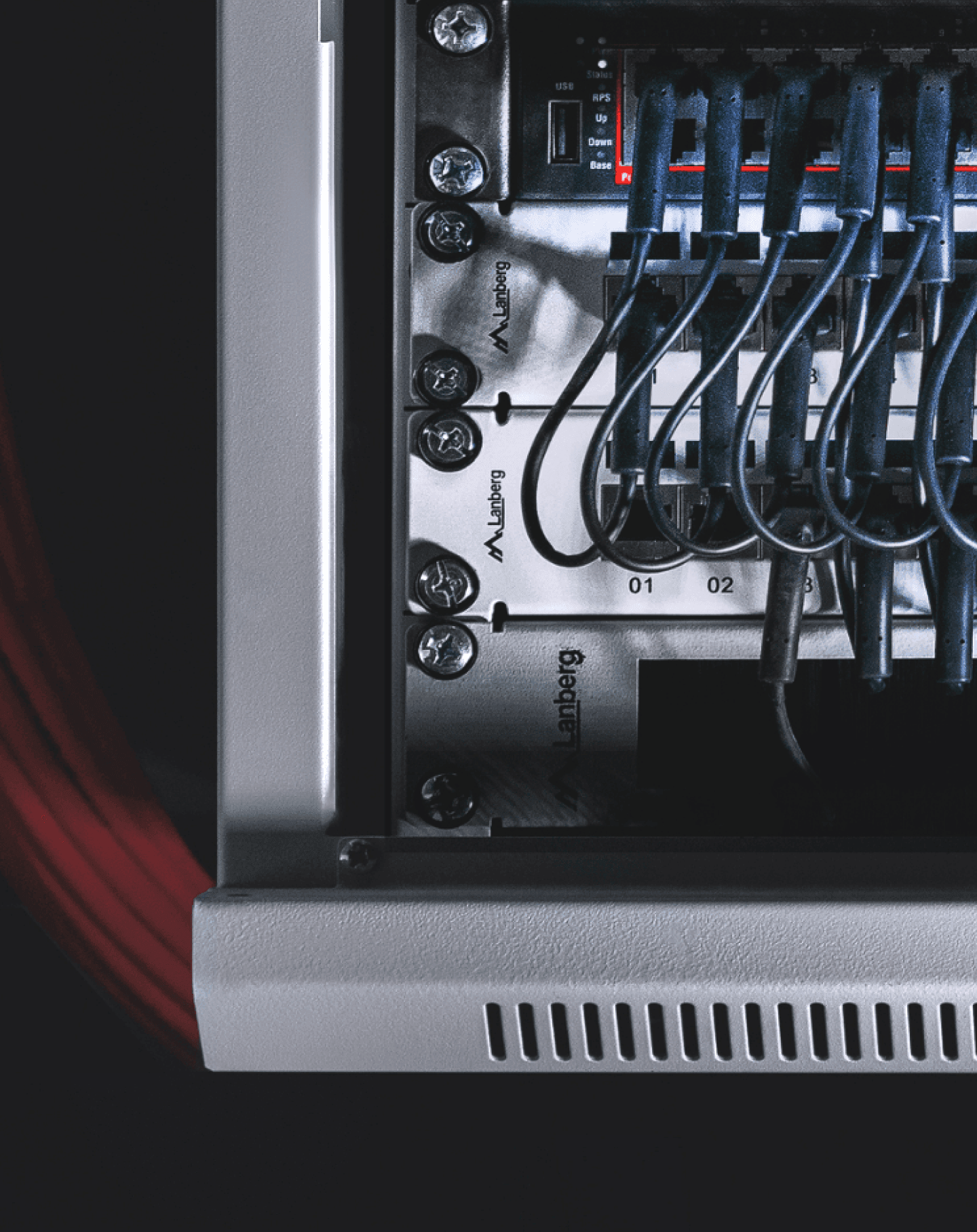 A technical rack with organized network and control infrastructure.