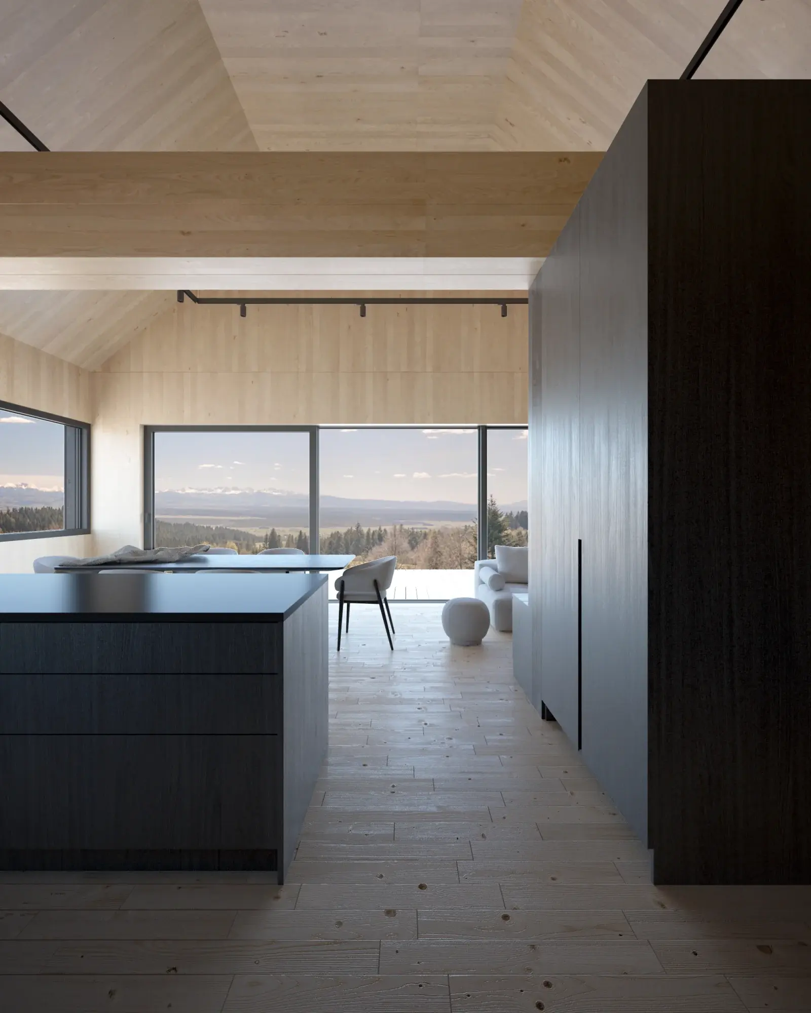 Visualisation of the open-plan day zone in a Hombee Home modular home, looking past a black kitchen island and tall cabinetry towards the living area and a glazed wall with a mountain view
