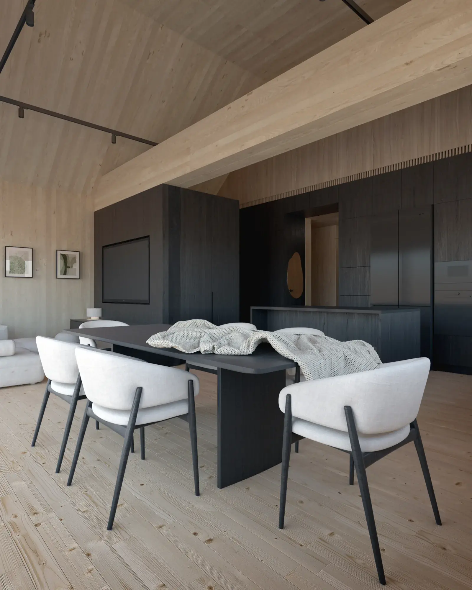 Visualisation of the dining area in a Hombee Home modular home with a table and upholstered chairs next to the dark fitted kitchen