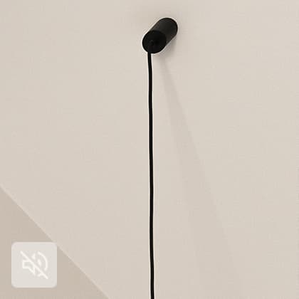 Three black, round ventilation nozzles mounted in a long, black profile under the ceiling. A white WiFi access point is also visible.